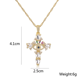 Detailed view of 18K gold plated cross pendant with evil eye design and dimensions