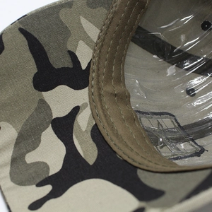 Detail view of camouflage baseball cap interior with canvas fabric and sturdy double stitching