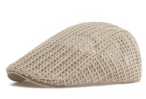 Close-up of beige summer mesh flat cap showing breathable hollow-out woven texture
