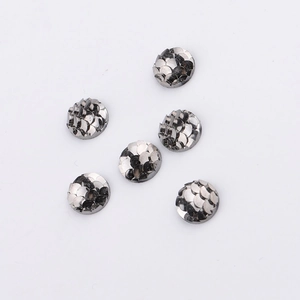 Detail view of 8mm silver fish scale resin stones with iridescent AB color finish