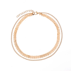 Double-layer golden fishtail sequin necklace with adjustable lobster clasp closure