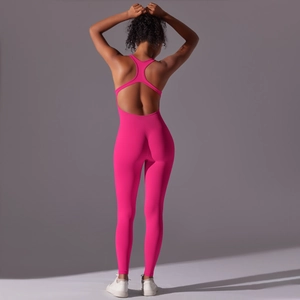 Detail of seamless yoga bodysuit with T-back cutout and sculpted compression fit