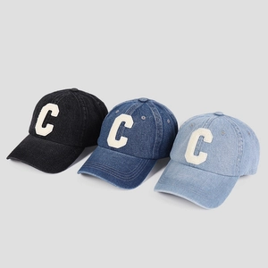 Three washed denim baseball caps with white letter C embroidery in black, blue, and light blue