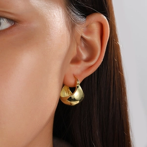 Polished 18K gold geometric wide hoop earrings for women with a sleek convex design