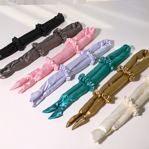 Set of heatless hair curlers in seven colors like silk satin for natural waves