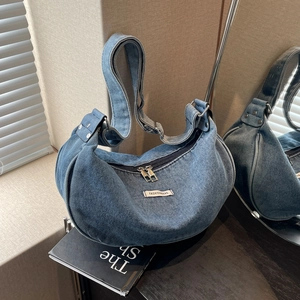 Japanese style crescent denim shoulder bag with metal zipper and fashion label