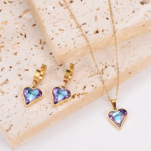 Fashion jewelry set with purple heart crystal necklace and matching gold hoop earrings
