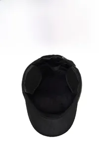 Close-up of black men's winter hat with thick warm fleece lining and ear flaps