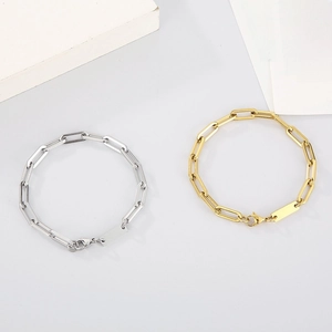 Minimalist rectangular paperclip chain necklace set in silver and gold steel