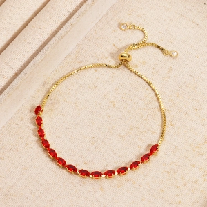 Detail of adjustable gold box chain with marquise ruby cubic zirconia and sliding clasp