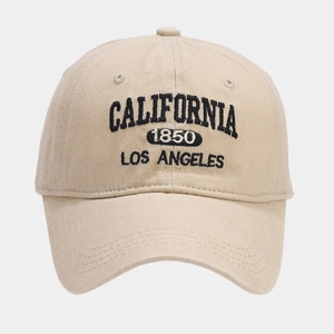 Close-up of California 1850 embroidery on vintage beige cotton baseball cap