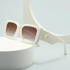 Modern white square sunglasses with gradient brown lenses and gold circle detail