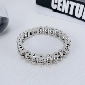 Detailed view of silver stainless steel biker chain bracelet with industrial link design