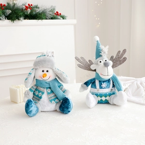 Blue and white plush Christmas snowman and reindeer dolls for festive tabletop decoration