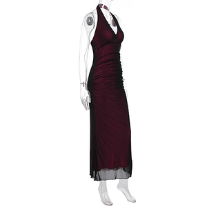 Detailed view of the elegant burgundy ruched mesh fabric and the side pleat craftsmanship
