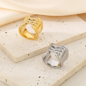 Exaggerated 18K gold plated stainless steel crisscross ring with pavé zircon stones