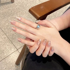 Handmade mermaid aurora press-on nails with pink glitter gradient and pearl accents