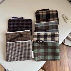 Plaid wool mini zipper pouch collection in assorted patterns for coins and cosmetics