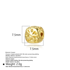 Macro view of 7.5mm square 18k gold-plated copper spacer bead with embossed plant texture