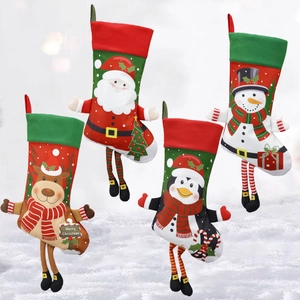 Large 3D Christmas stockings featuring Santa Claus, reindeer, penguin and snowman characters