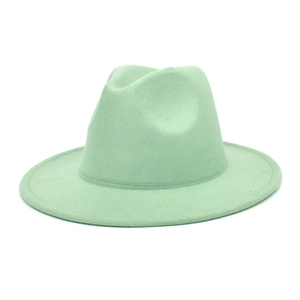 Close-up of mint green fedora hat featuring a classic indented crown and stitched brim