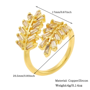 Detail view of gold leaf ring with zircon inlay showing 17mm width and material specs