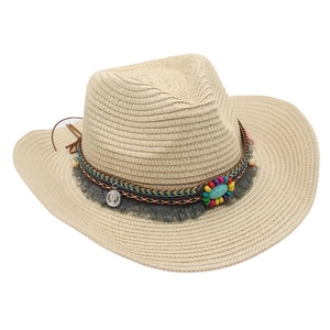 Detailed view of ethnic western cowboy straw hat with turquoise beads and tassels