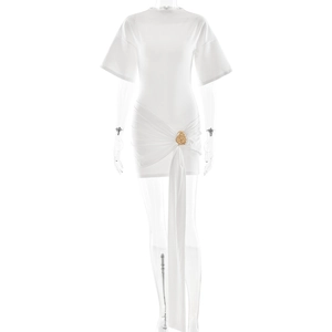 Detail of white mini dress with gold buckle and pleated fabric drape detail