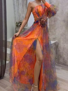 Elegant one-shoulder floral evening dress in vibrant orange and magenta with feather detail