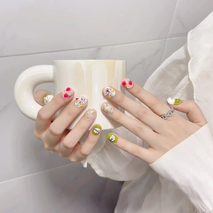 Cute short round press-on nails with colorful hand-painted flowers and pink heart patterns