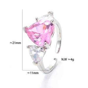 Detailed view of adjustable silver heart ring with pink stone and dimensions mark