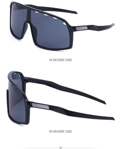 Side views of black cycling sunglasses with gray lenses and silver anti-slip details