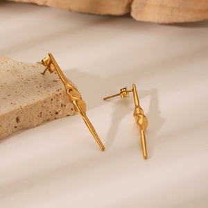Minimalist golden spiral long needle stud earrings in polished stainless steel for women