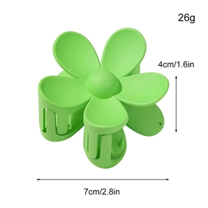 Green matte daisy hair claw clip size details 7cm width and 26g weight on white background
