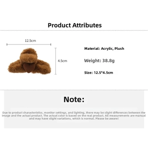 Detail view of brown plush hair claw clip with size measurements 12.5x4.5cm and acrylic material