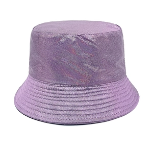 Detail shot of the shiny holographic purple bucket hat with metallic texture and fine shimmer