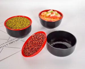 Detail of red and black dual-color food model bowl used as a versatile storage organizer