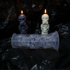 Detailed macro of 3-cavity silicone skull mold for Halloween DIY horror candles