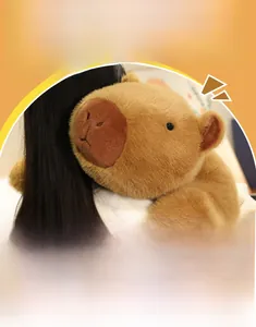 Detail of plush capybara pillow with fluffy brown fur and soft full filling comfort