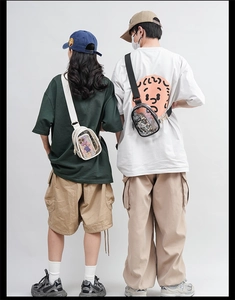 Detailed view of clear PVC candy color crossbody chest bags on male and female models