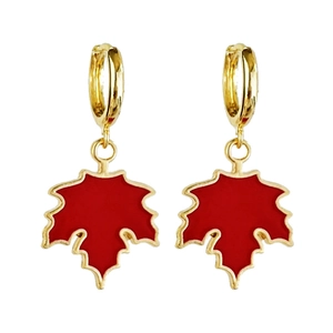 Detailed close-up of golden hoop earrings featuring delicate red maple leaf pendants