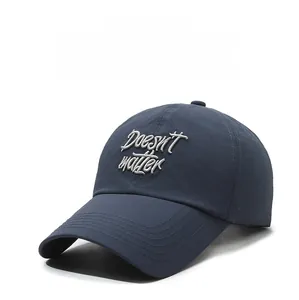 Detail of breathable mesh holes and embroidered letters on quick-dry sun protection hat