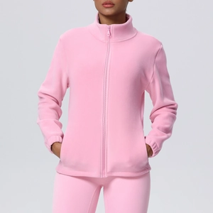 Close-up of pink fleece zipper jacket texture and stand collar details for yoga sports