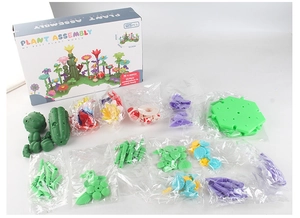 Flat lay of 125pcs DIY garden building block set with colorful flowers and parts in box