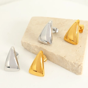 Minimalist geometric triangle stud earrings in polished gold and silver finishes