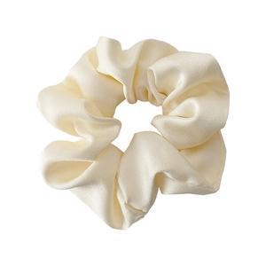 Premium cream satin scrunchie with elegant silk texture and soft aesthetic folds