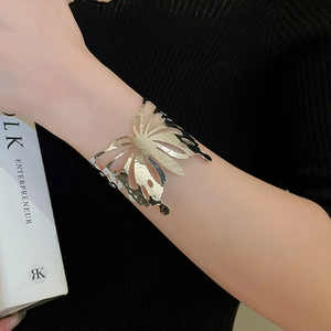 Polished silver butterfly hollow open bangle cuff with artistic metallic mirror finish