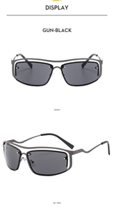 Front and side view of Y2K vintage gun-metal sunglasses with hollowed-out frame detail