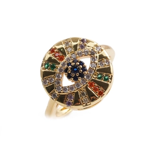 Detail of gold evil eye ring with colorful zircon stones in blue, green and purple