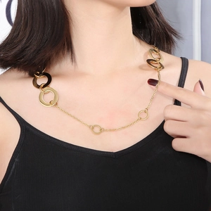 Golden titanium steel necklace for women featuring chic geometric multi-ring pendant design